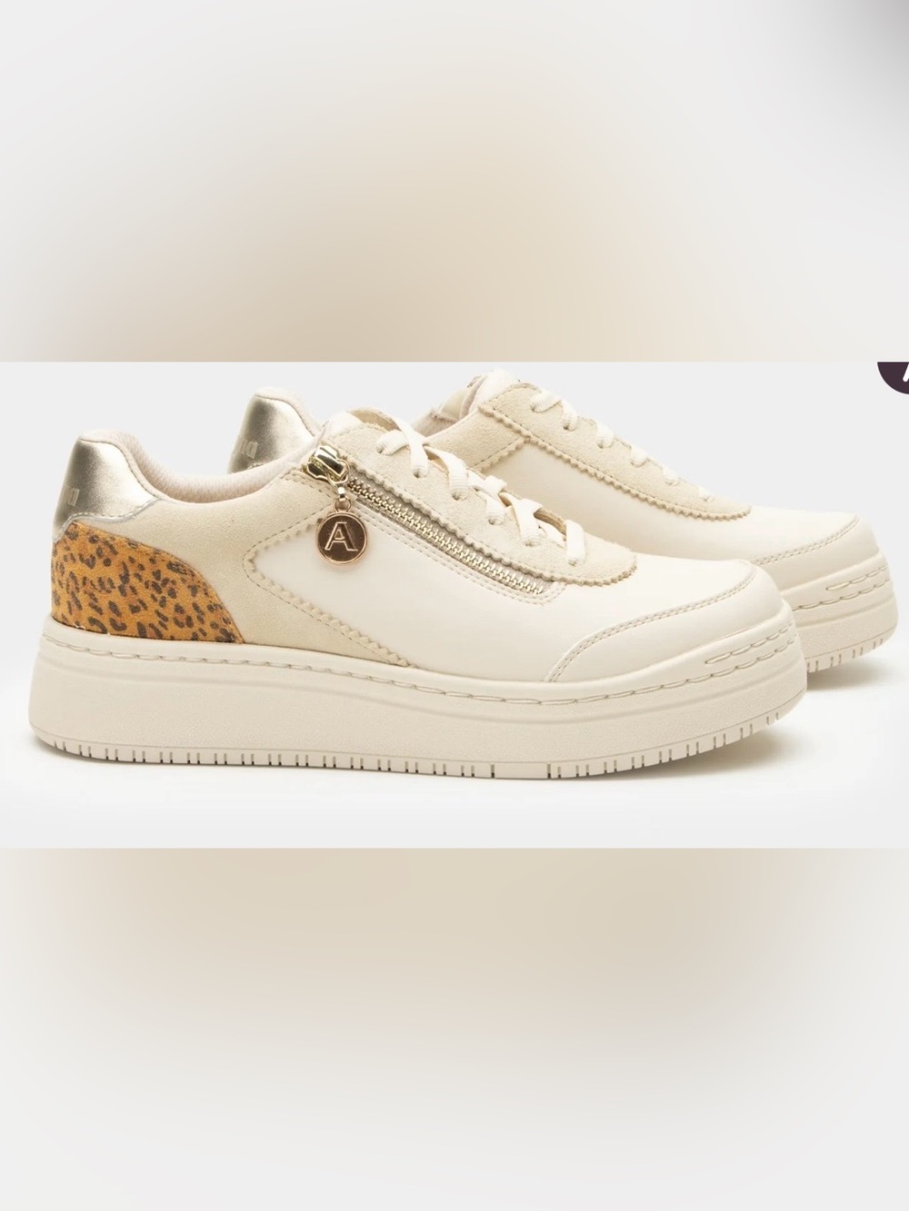 Alegria Cream Platform Sneakers with Gold Heel Zip Enclosure and Leopard Accent.